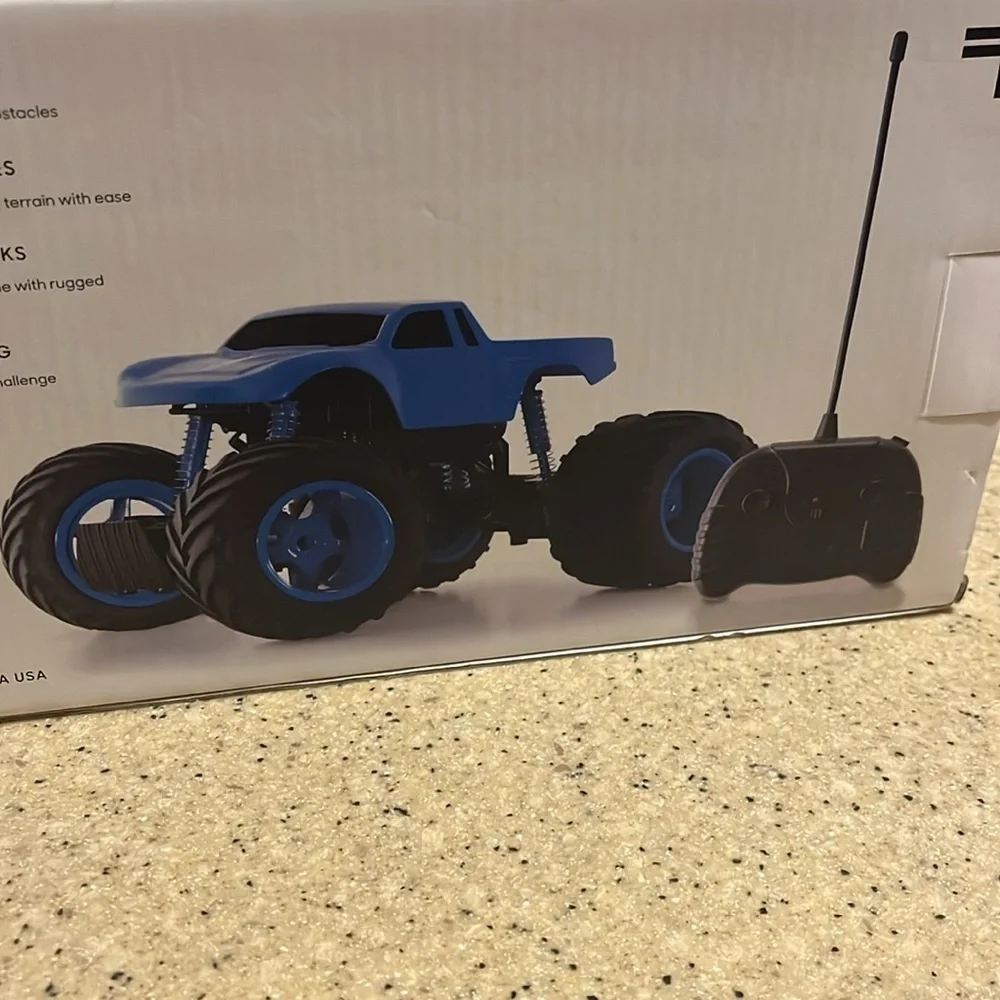 Brand New Sharper Image Remote Control Mini Monster Truck Rockslide Blue Toy